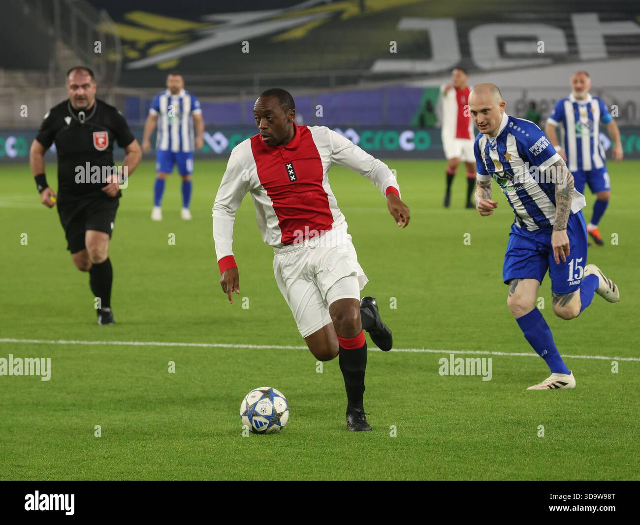 KIKI MUSAMPA of Ajax Legends runs with the ball during the friendly match between Dinamo Tbilisi Legends and Ajax Legends at the Boris Paitchadze Dina Stock Photo