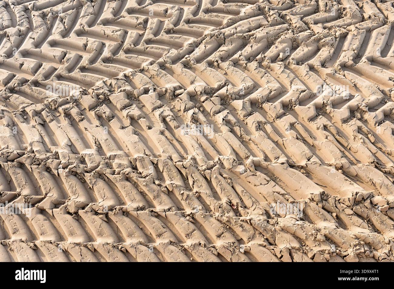 Tyre track pattern in sand, UK Stock Photo