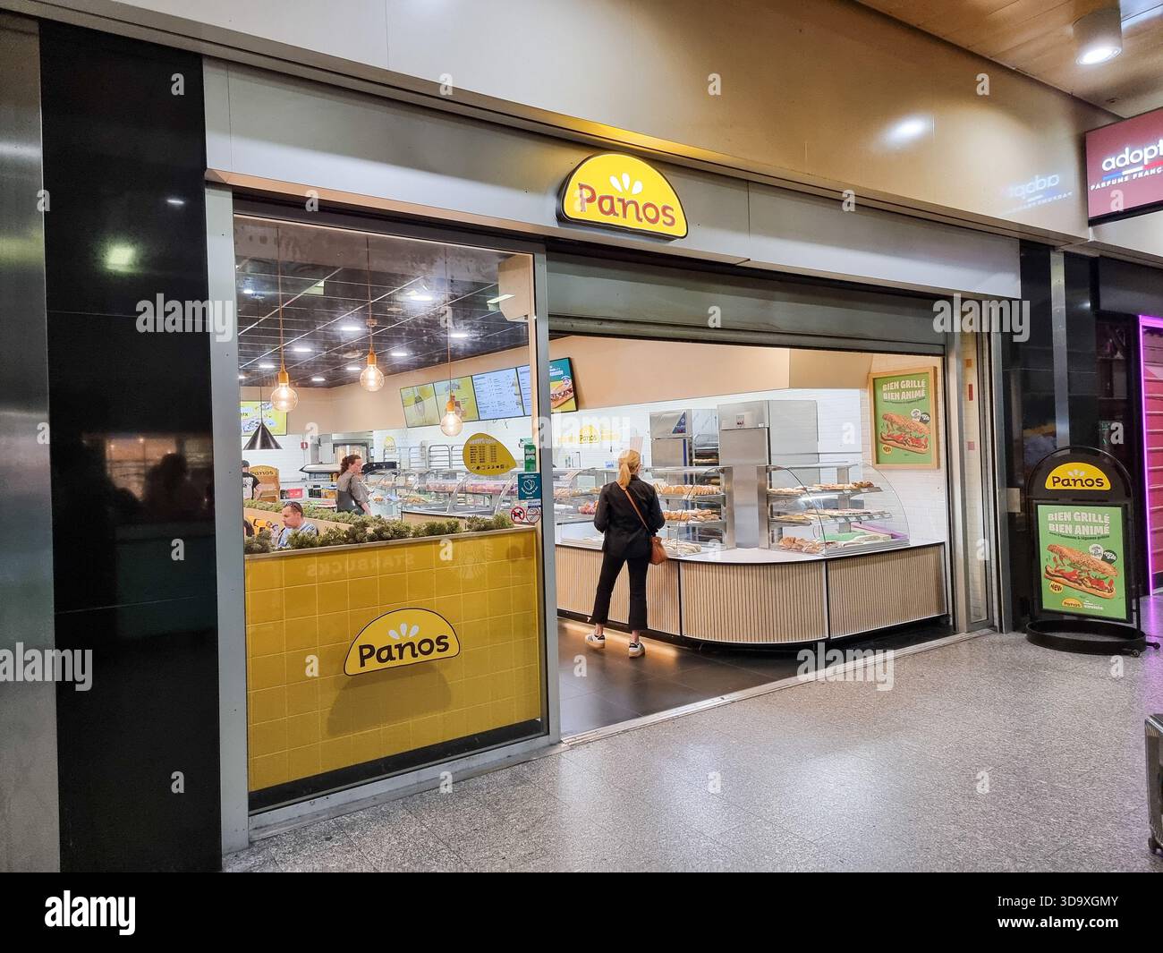 A Panos bakery shop in Brussels South station, Belgium, part of La Lorraine Bakery Group - Smartphone Captured Stock Image