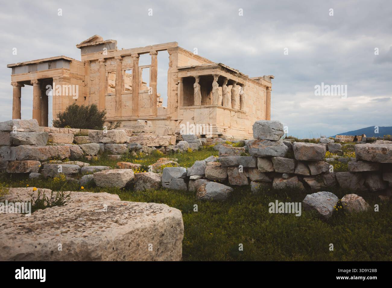 The ancient Erechtheion on the Acropolis in Athens, Greece, features ...
