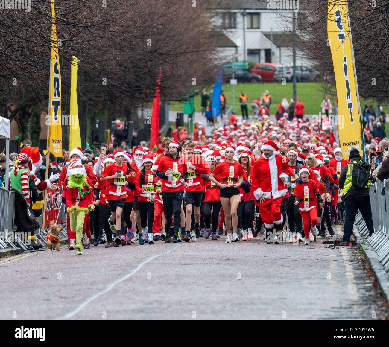 Glasgow Scotland, UK. 7th December 2025. The annual Santa Dash, a 5K ...