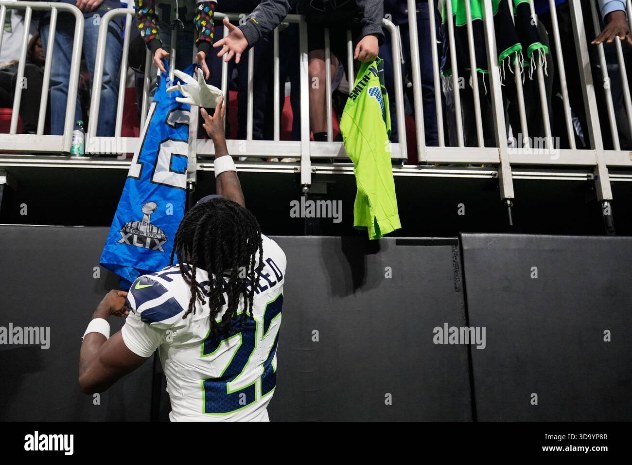 Raheed Shaheed Uniform Seattle Seahawks wide receiver Rashid Shaheed gives his gloves to fans ...
