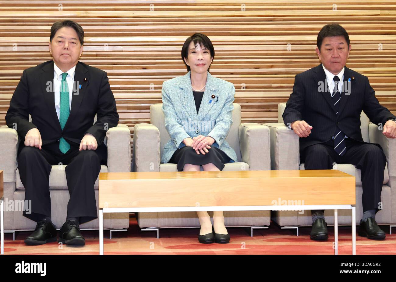 Japanese Prime Minister Sanae Takaichi (C) attends a cabinet meeting at ...