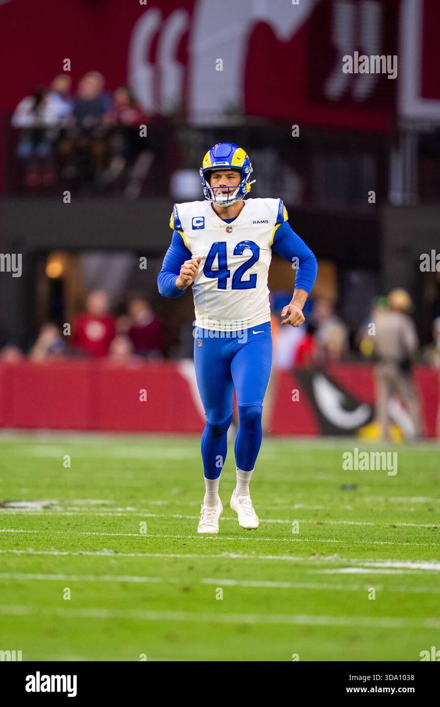 Los Angeles Rams punter Ethan Evans (42) runs during an NFL football ...