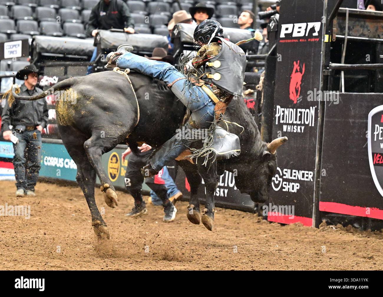 ST. LOUIS, IA - DECEMBER 07: Bullrider Logan Biever looses his grip ...