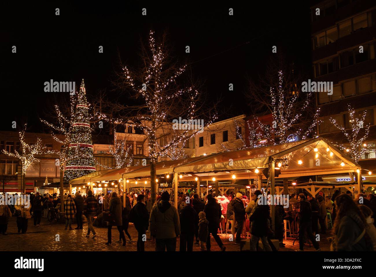 AALST, BELGIUM, 5 DECEMBER 2025: Evening view of the Christmas Market in Aalst. The market runs through the holiday period and is a popular place to v - Stock Image
