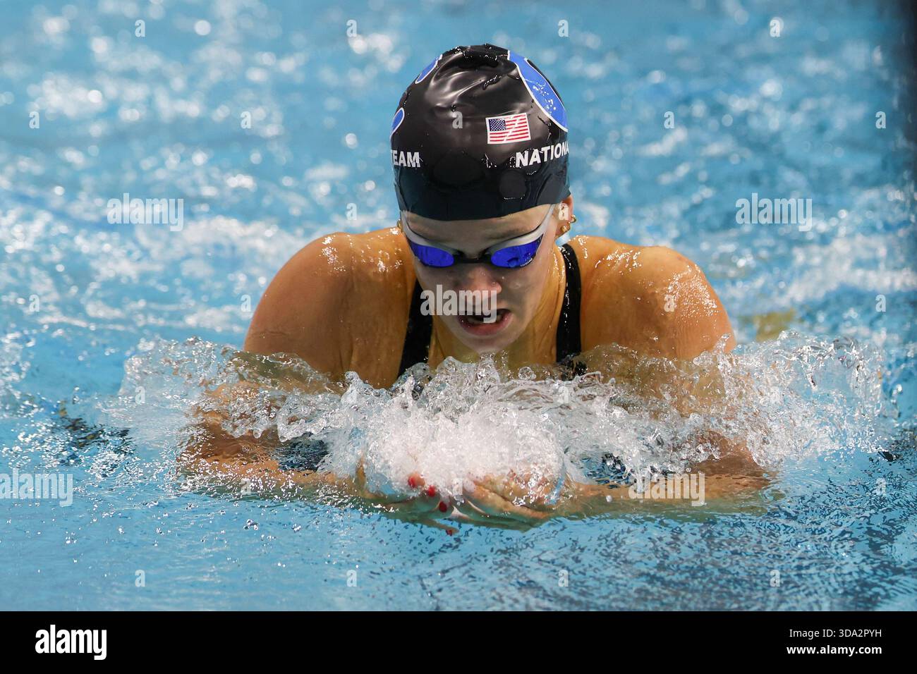 AUSTIN, TX - DECEMBER 04: Alex Shackell swims the breaststroke leg of a ...