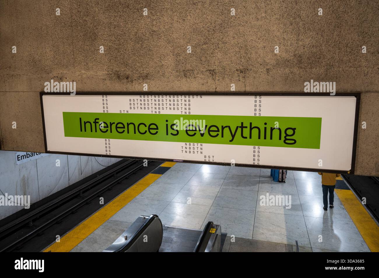 advertising-sign-reading-inference-is-everything-above-escalators-and