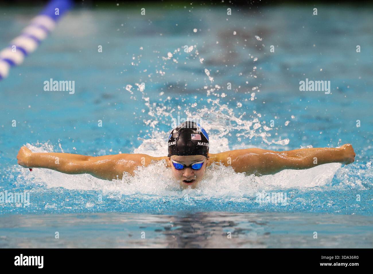 AUSTIN, TX - DECEMBER 05: Alex Shackell competes in a women's 100 meter ...