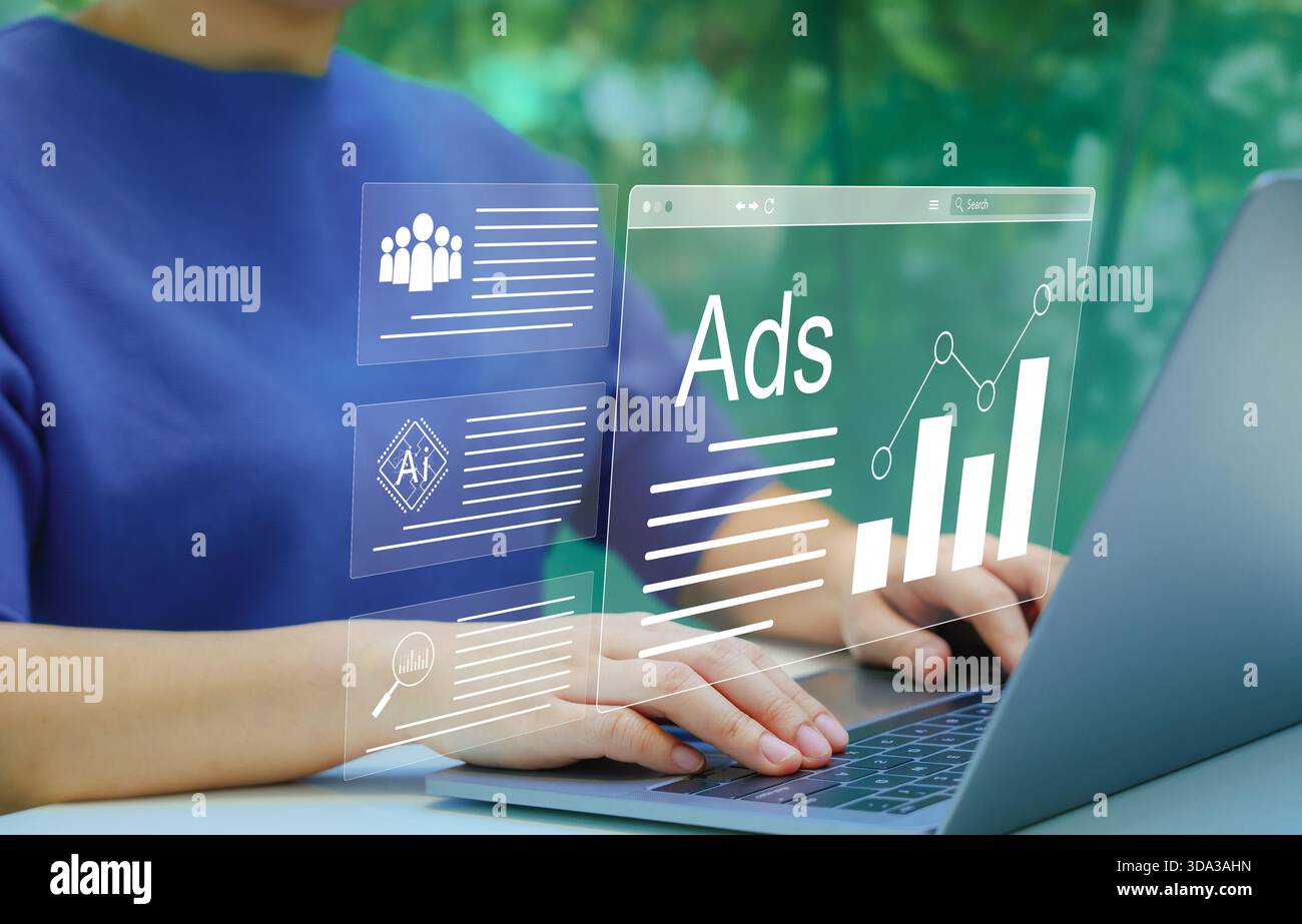 AI Analyzing Online Advertising Campaigns. Digital marketing concept. Person using laptop with virtual displays Ads and graphs, AI technology in digit Stock Photo