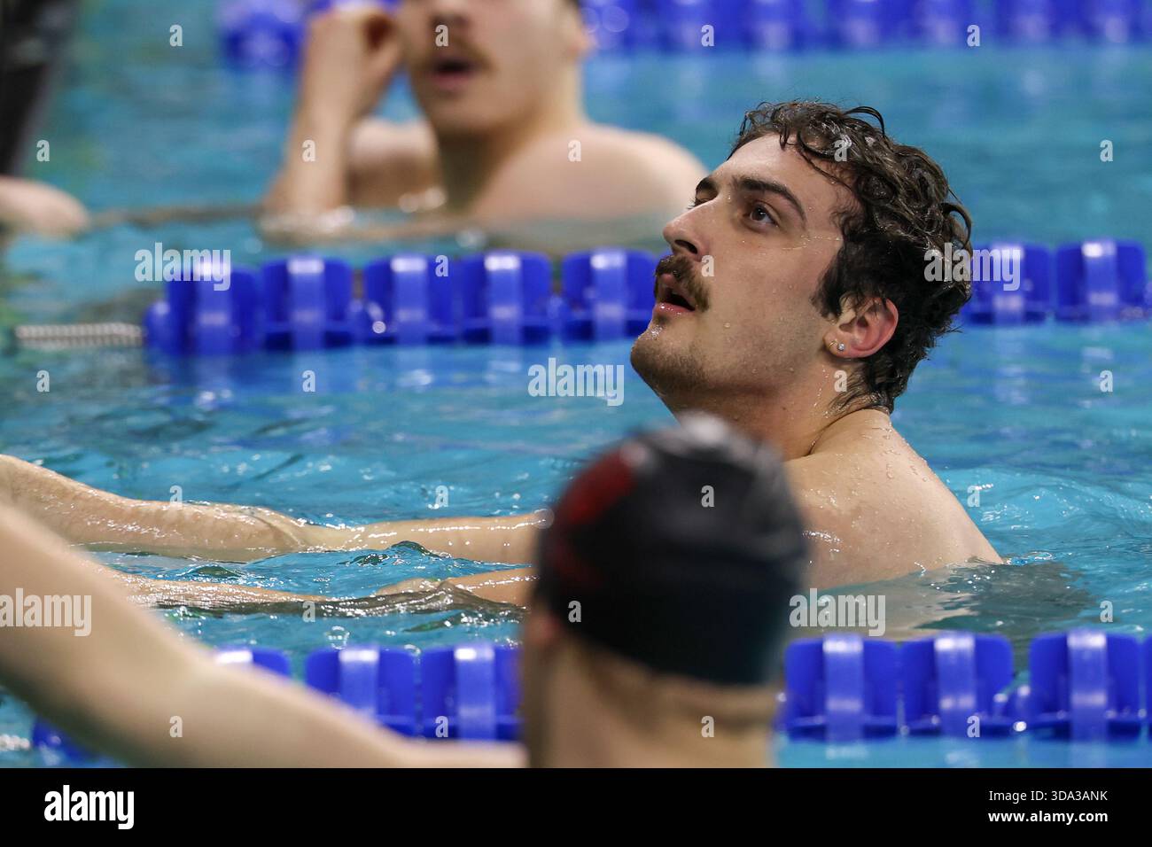 AUSTIN, TX - DECEMBER 05: Van Mathias in the pool after a men's 100 ...