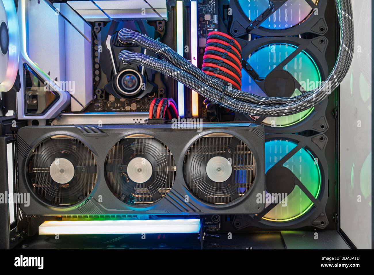 High-End Computer Components RGB Lighting and Advanced Cooling Systems Inside View. Stock Photo