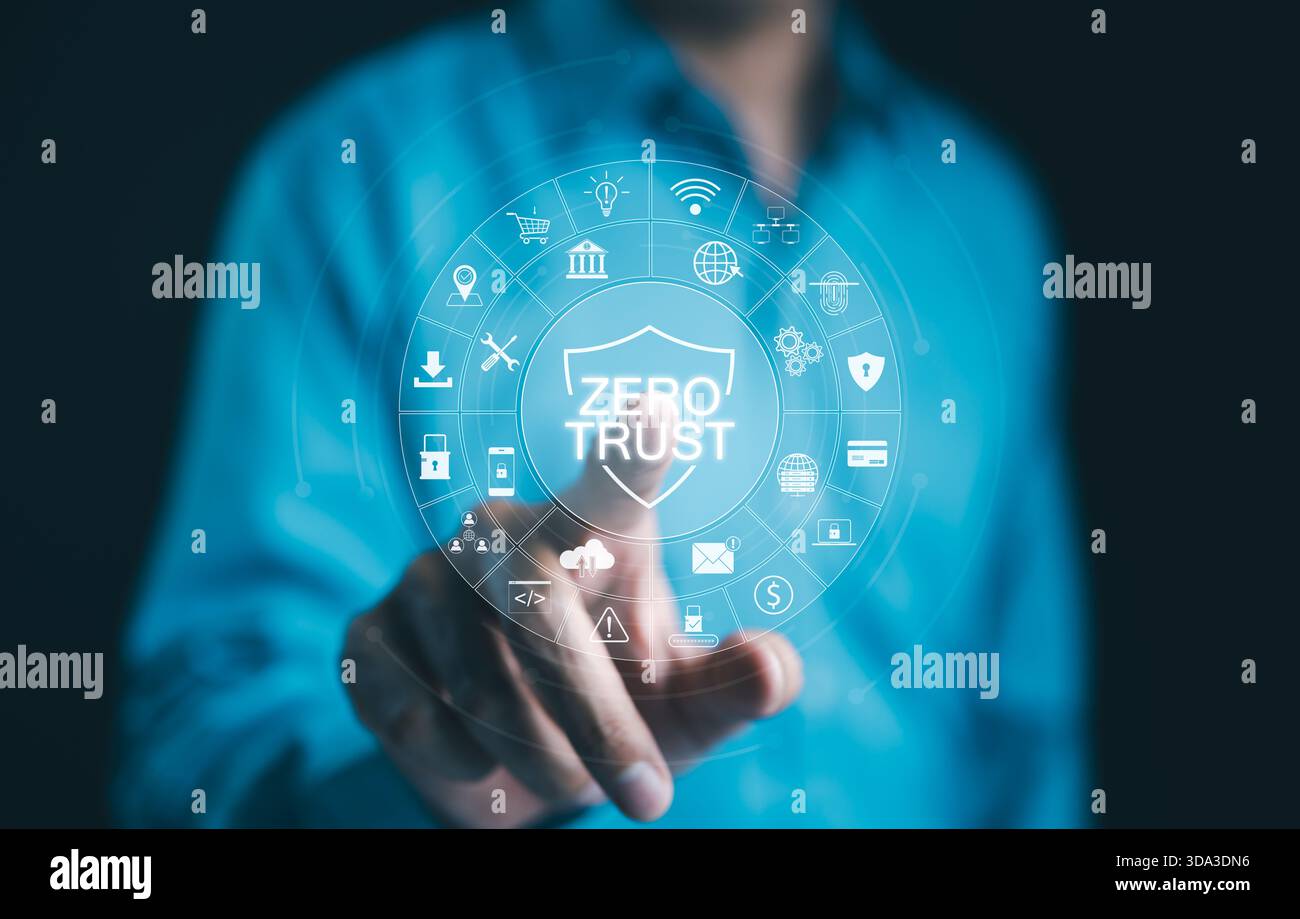 Zero Trust Security Concept. Businessman touch virtual icons zero trust security, cloud protection, business information network security, shields, co Stock Photo