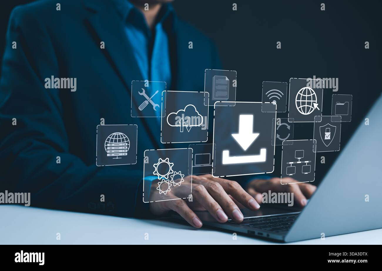 Digital Download and Data Storage Technology. Businessman using laptop with digital icons represent data download, cloud storage, networking, and syst Stock Photo