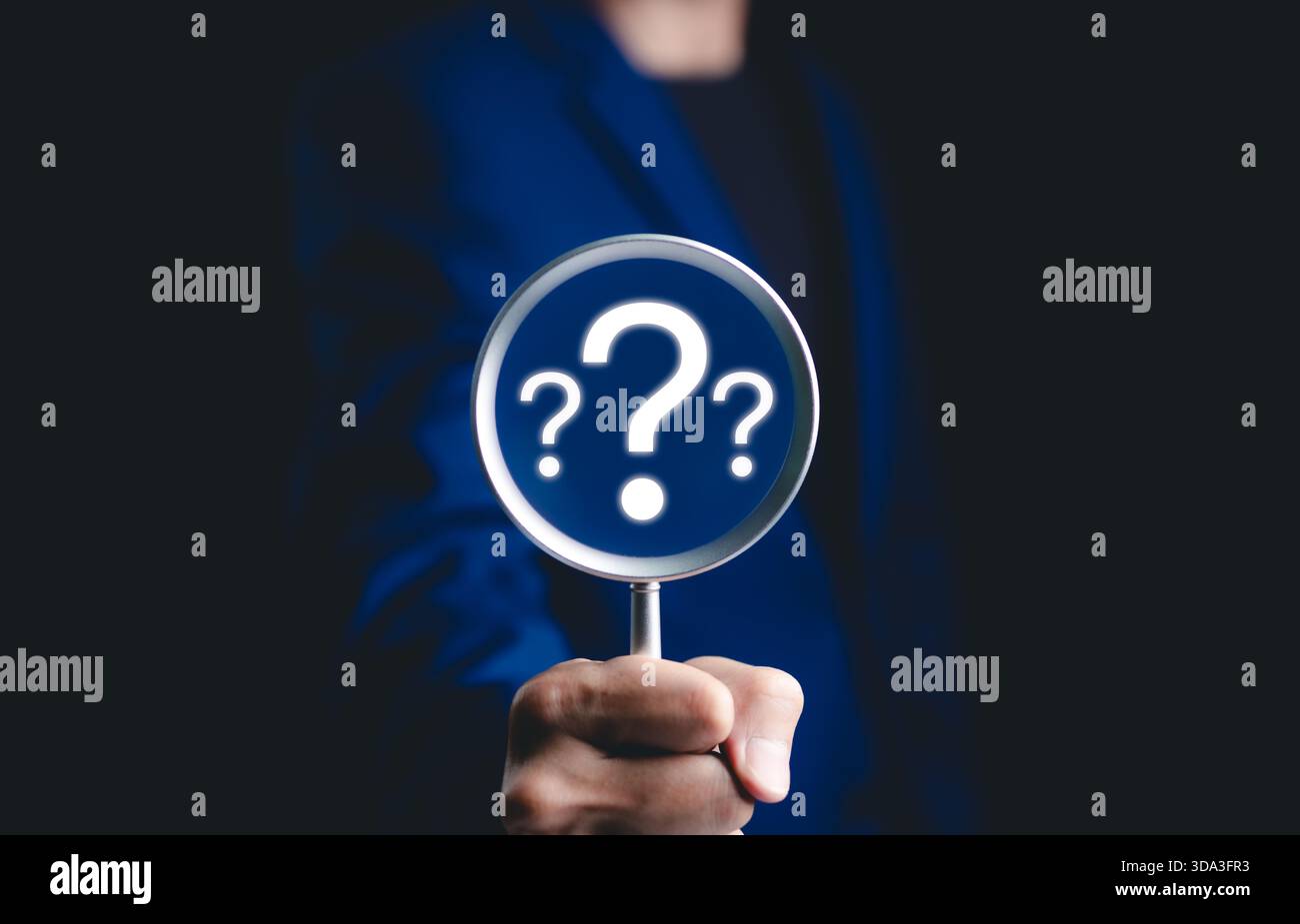 Focused Question Image Question mark, Problem solving and analysis concept. Businessman holds ...