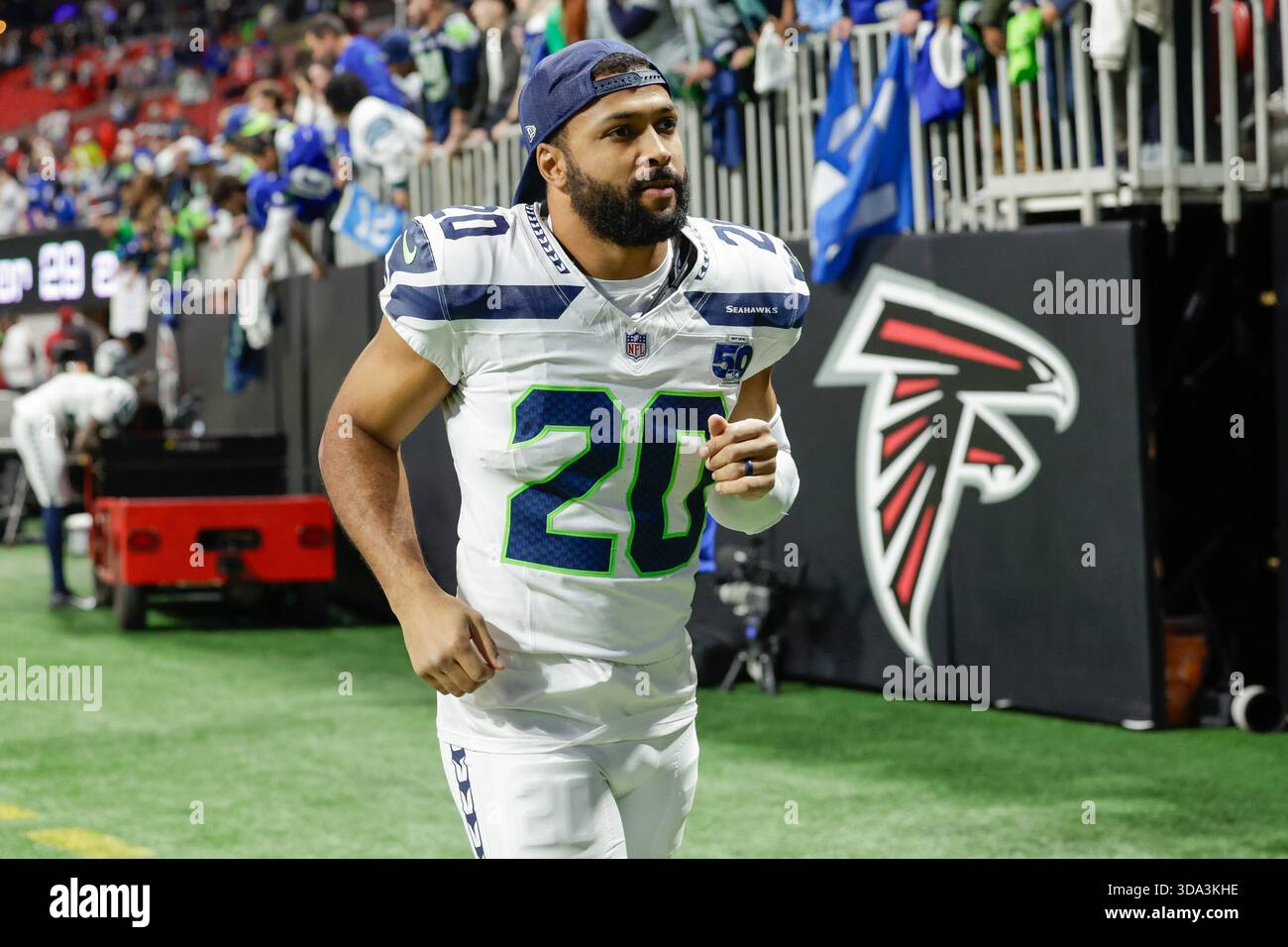 Seattle Seahawks safety Julian Love (20) walks off the field following