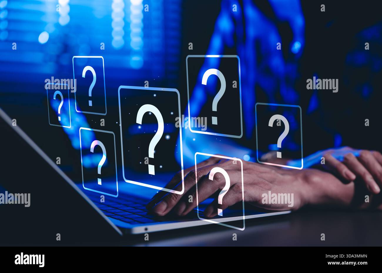 Question Mark and Problem Solving Concept. A person using a laptop with floating question marks, symbolizing brainstorming, problem-solving, Stock Photo