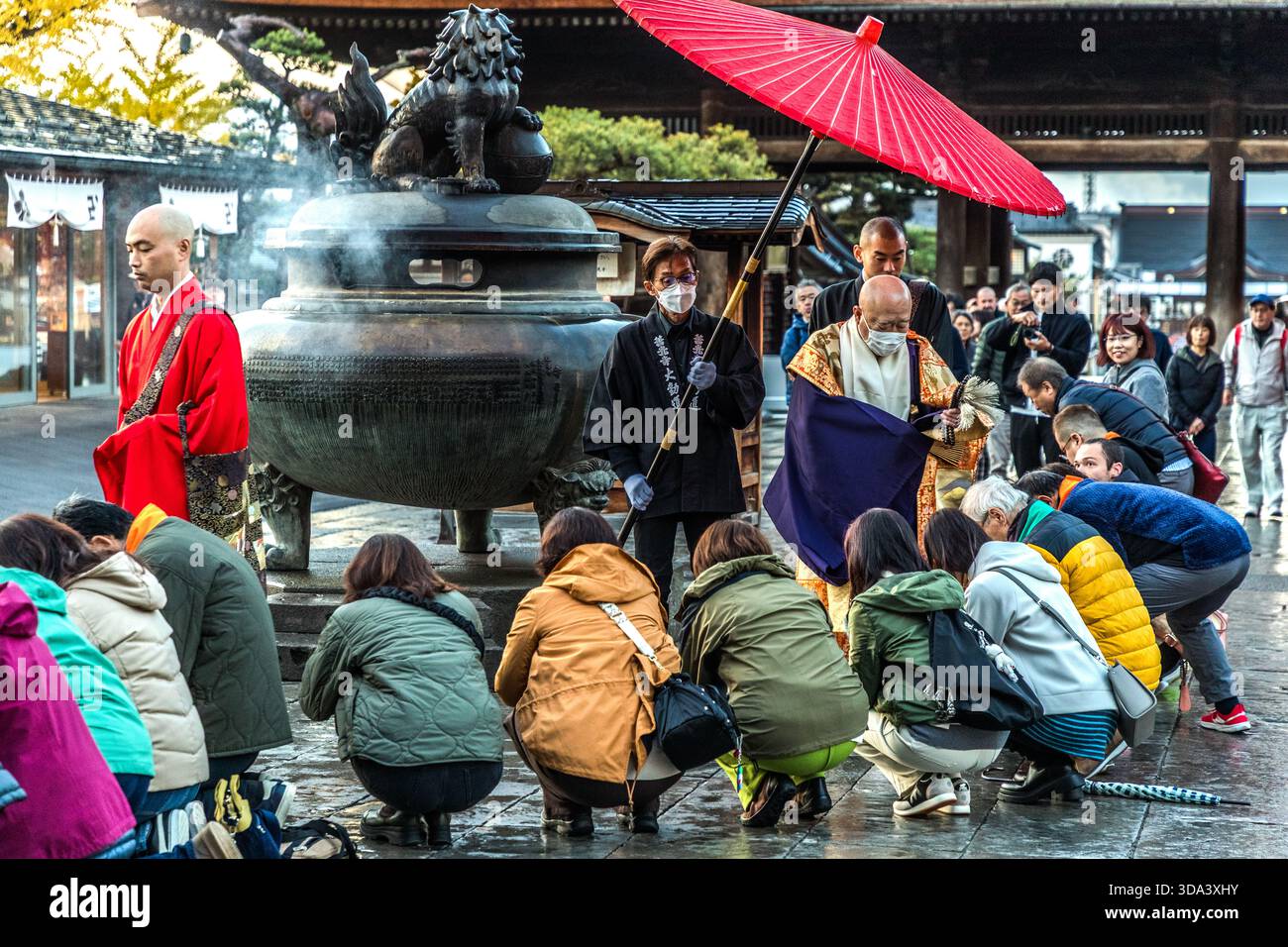 Large umbrella in a crowd hi-res stock photography and images - Alamy