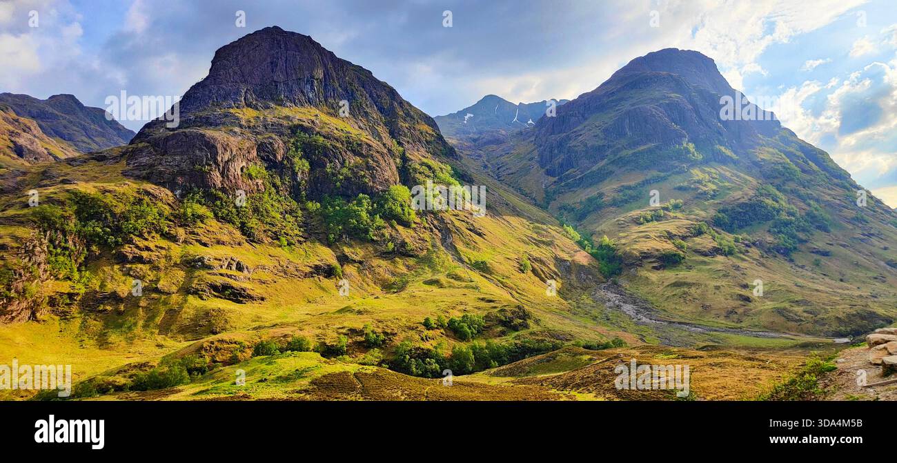 Iconic Glencoe valley and the Three Sisters bathed in summer light ...