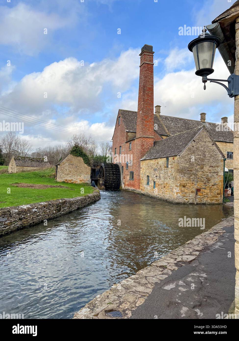 Historic Watermill with Overshot Wheel in Lower Slaughter, Cotswolds Egland Uk - Smartphone Captured Stock Image