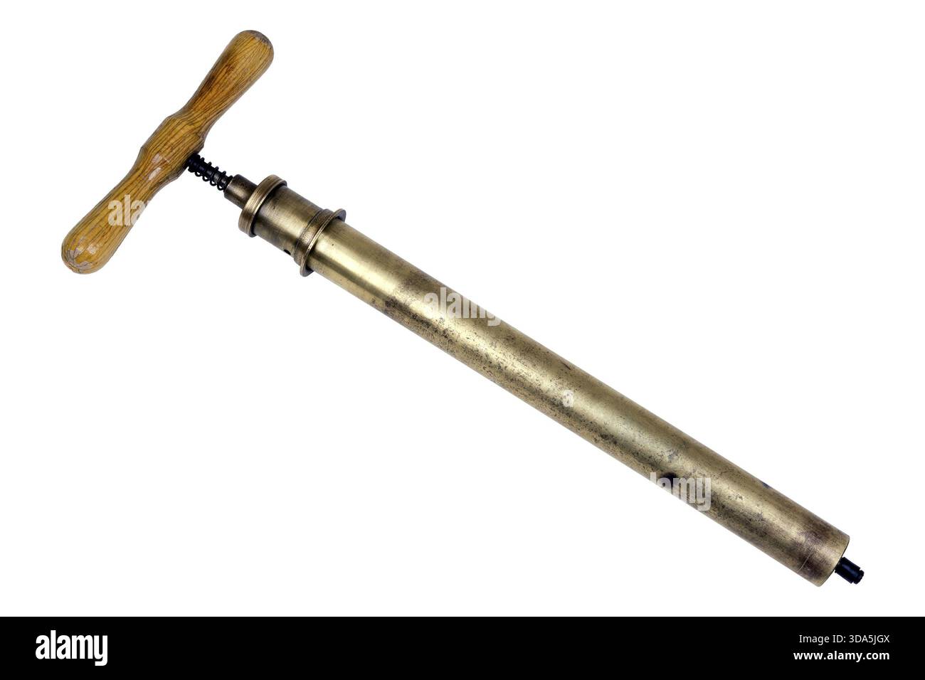 Old bicycle pump created from brass Stock Photo