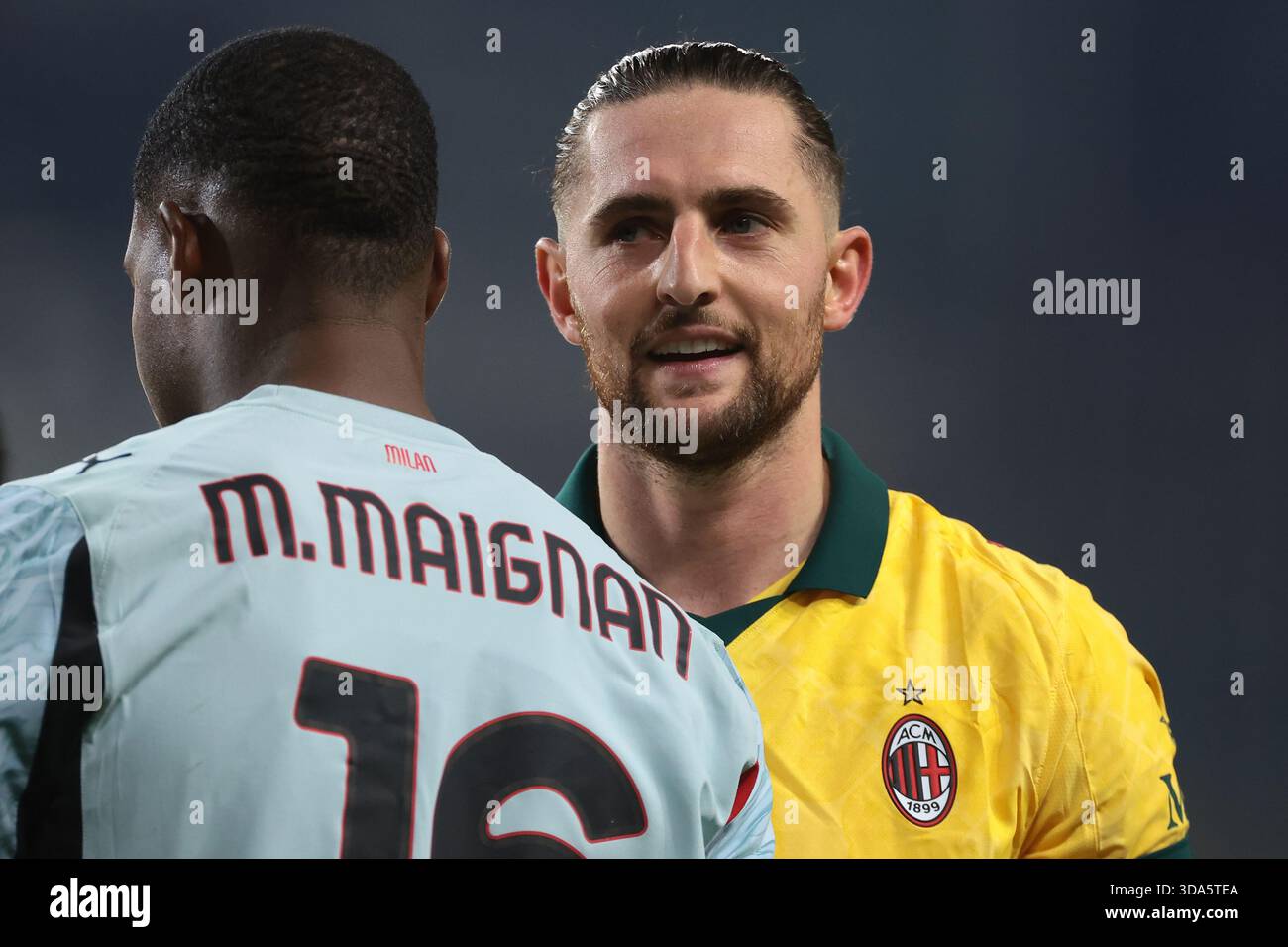Turin, Italy, 8th December 2025. Adrien Rabiot of AC Milan reacts with ...