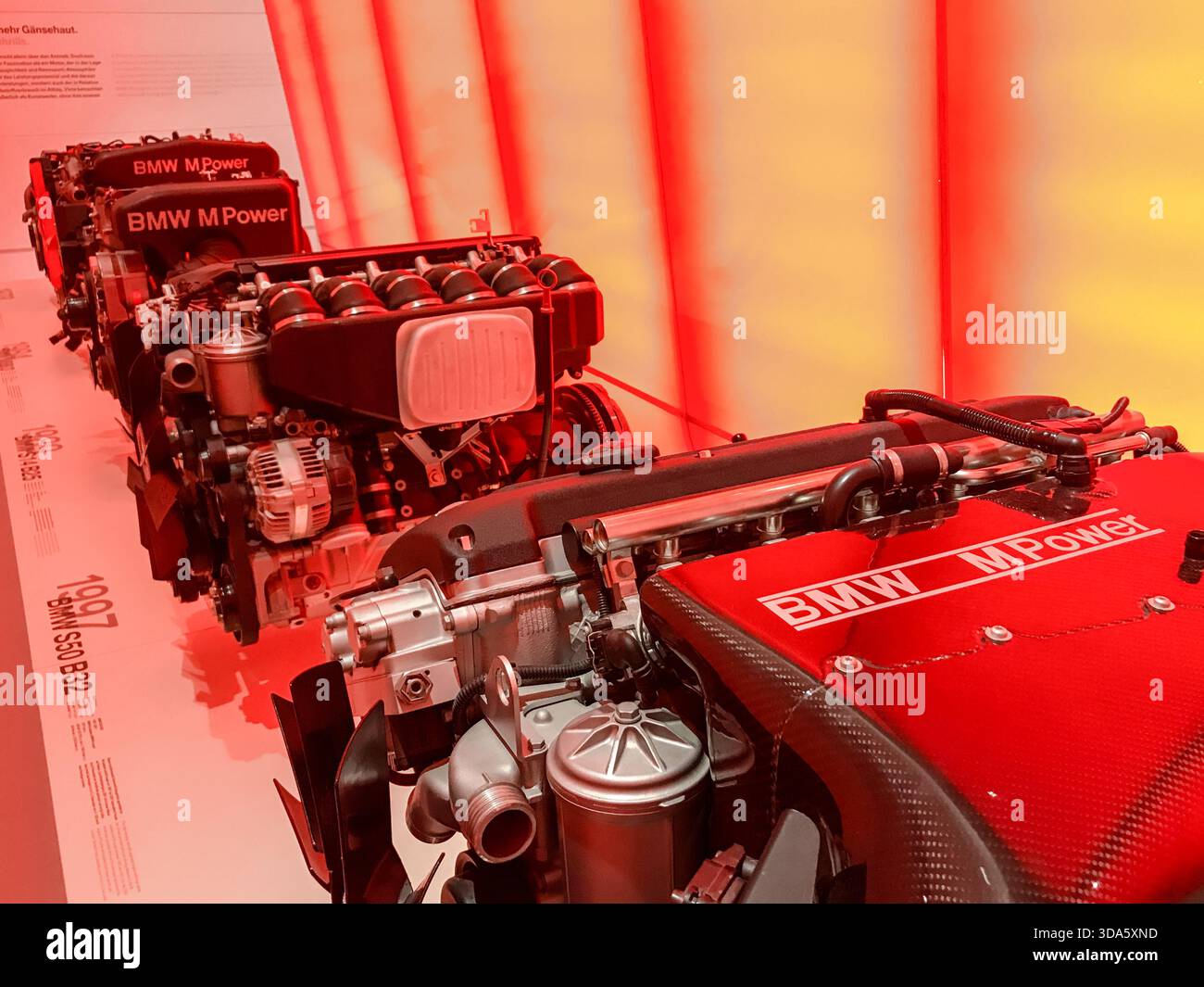 Germany Engine Historic BMW M Power engines displayed in a red-lit exhibition space at ...