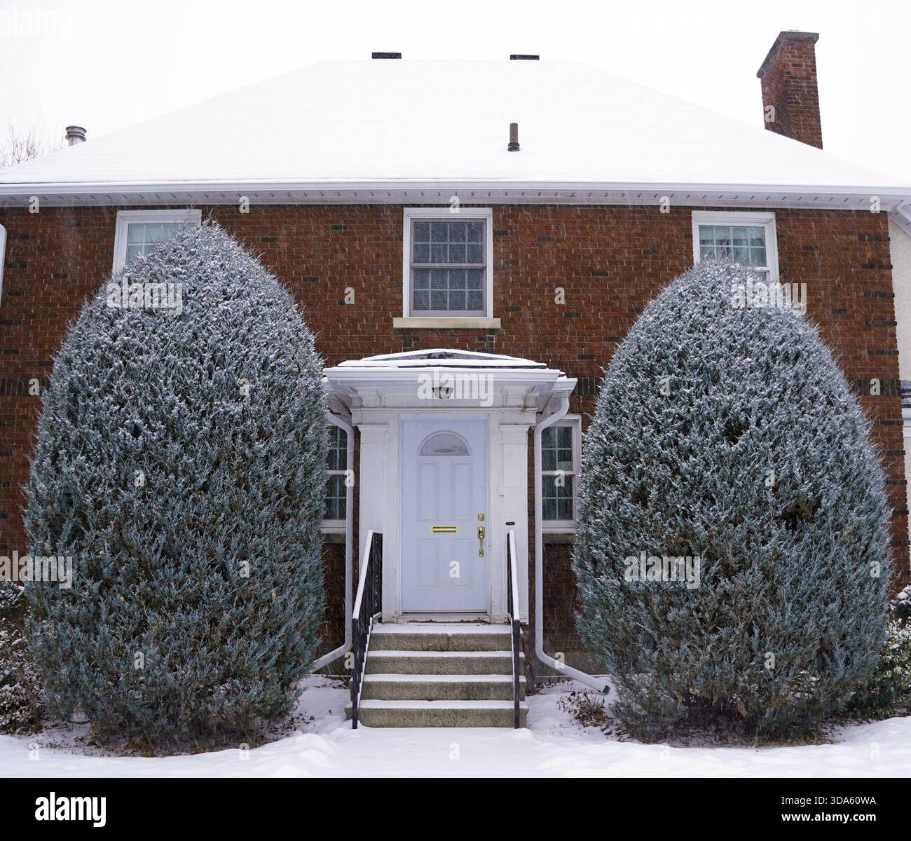 two-story red brick house in Ottawa Stock Photo