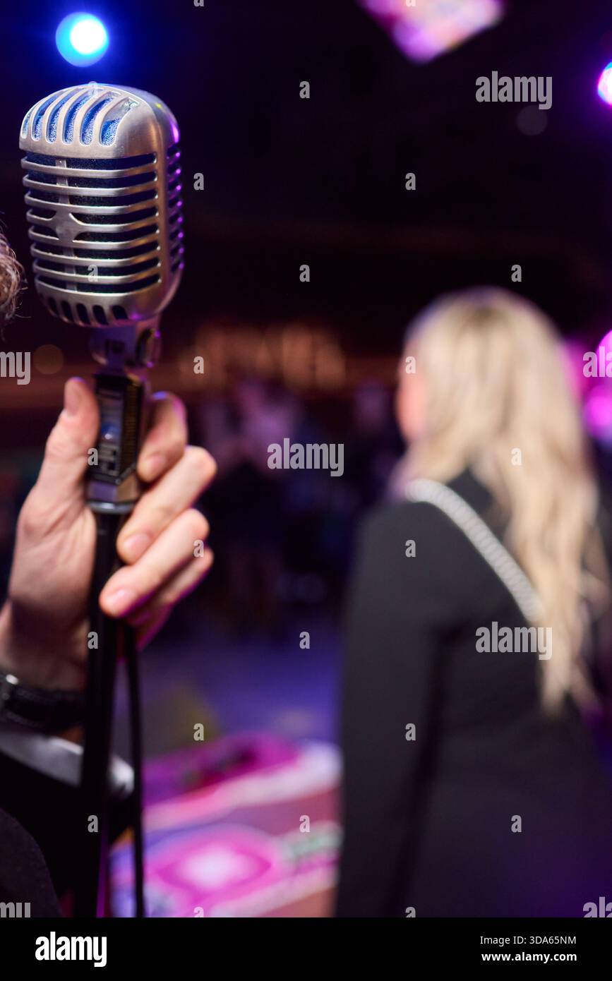 The Iconic Classic Microphone Hand Gesture, Perfectly Captured in a ...