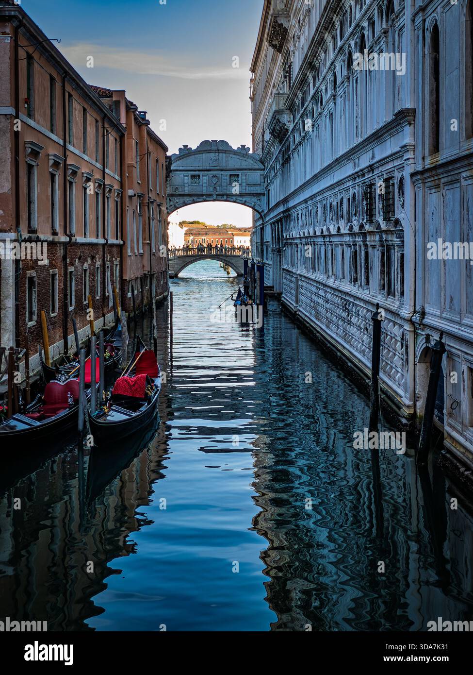 Bridge of Sighs with a gondola passing underneath, as seen from Ponte de Canonica, Venice - Smartphone Captured Stock Image
