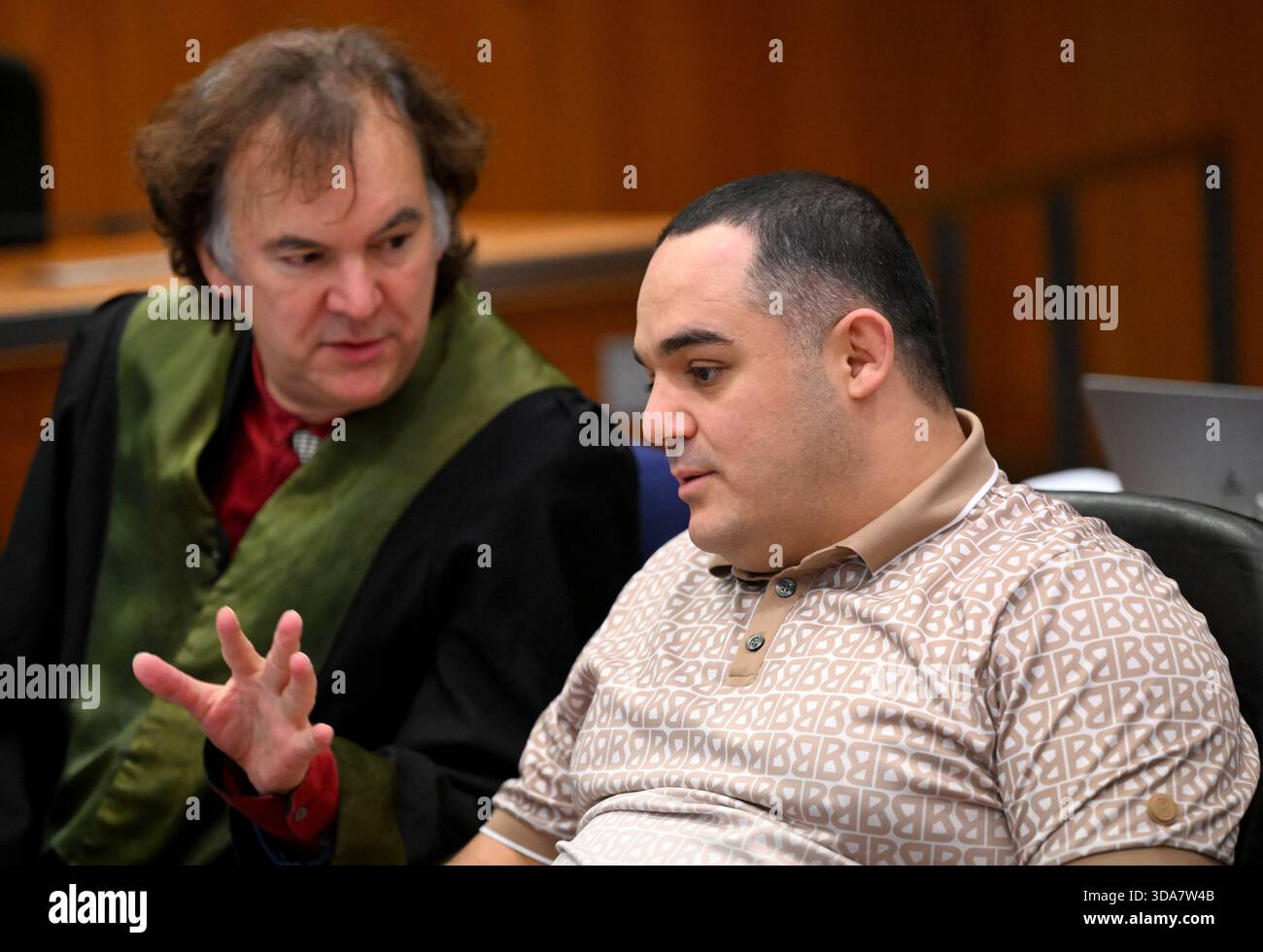 Danny Beisel 09 December 2025, Hesse, Frankfurt/Main: One of the three defendants ...