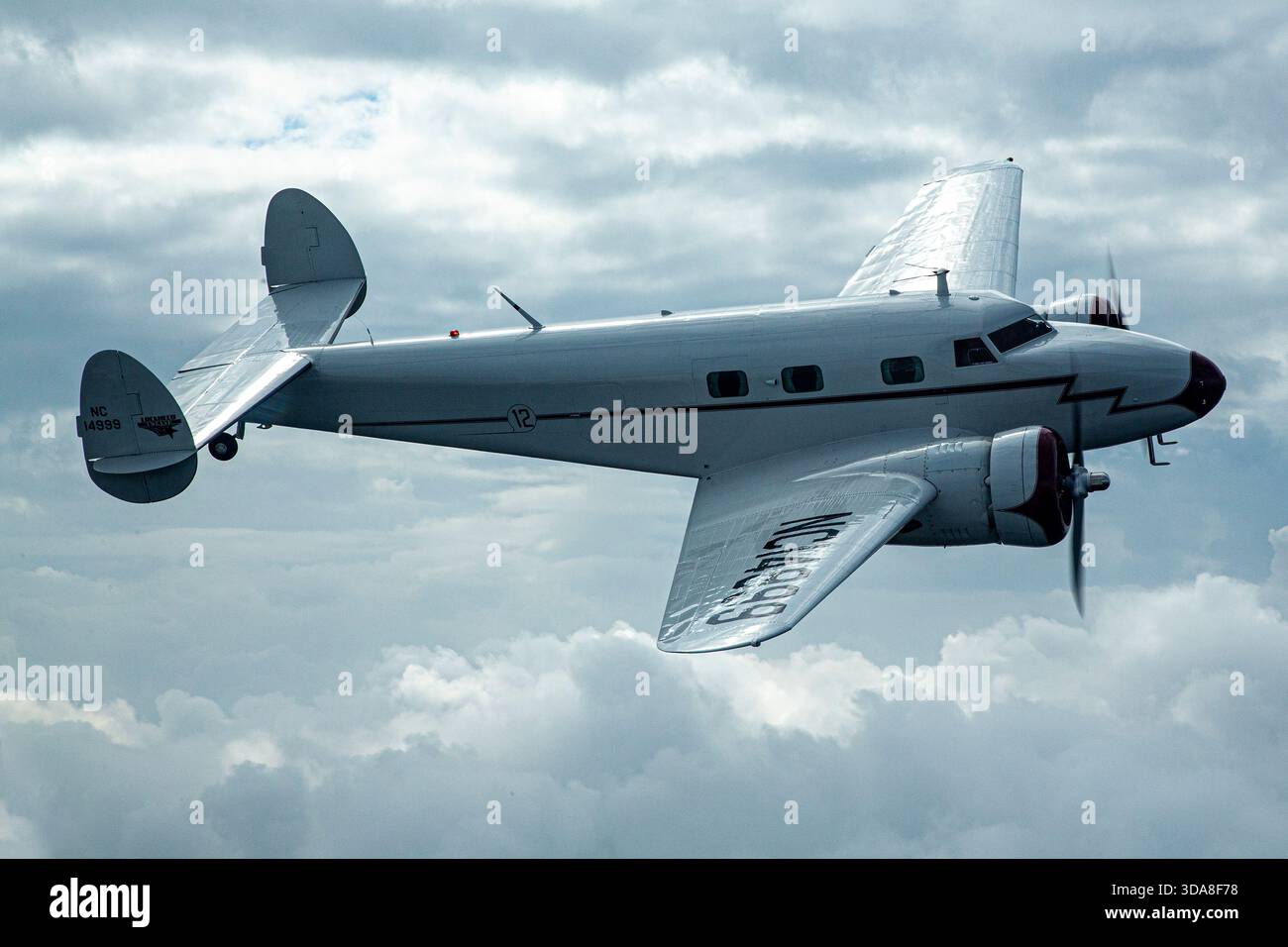 Lockheed 12 Electra Junior, registered NC14999, captured air-to-air ...