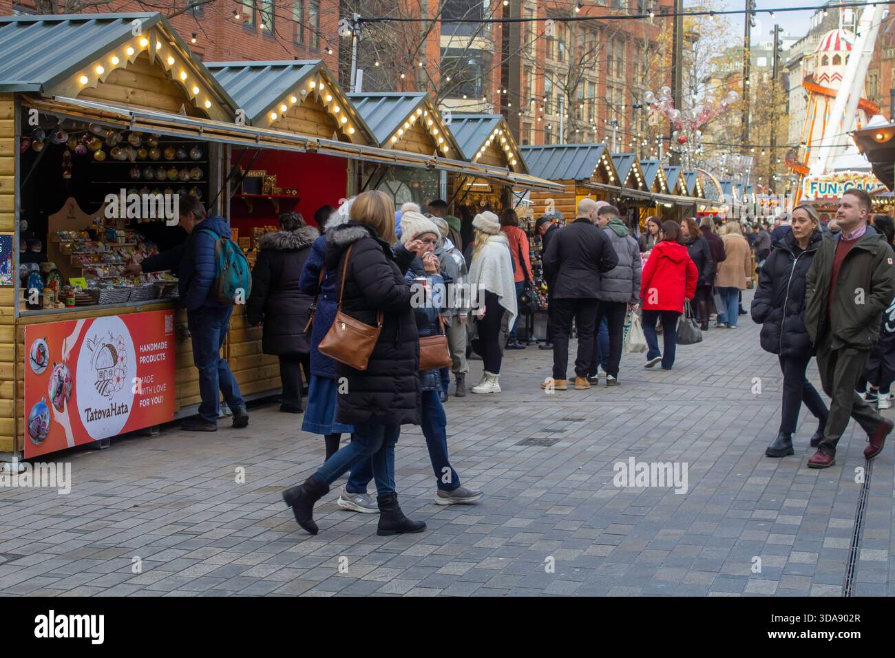 3 December 2025 Part of the busy Manchester Christmas market located in the centre of the city in Piccadilly Gardens. viewed in late afternoon early e Stock Photo