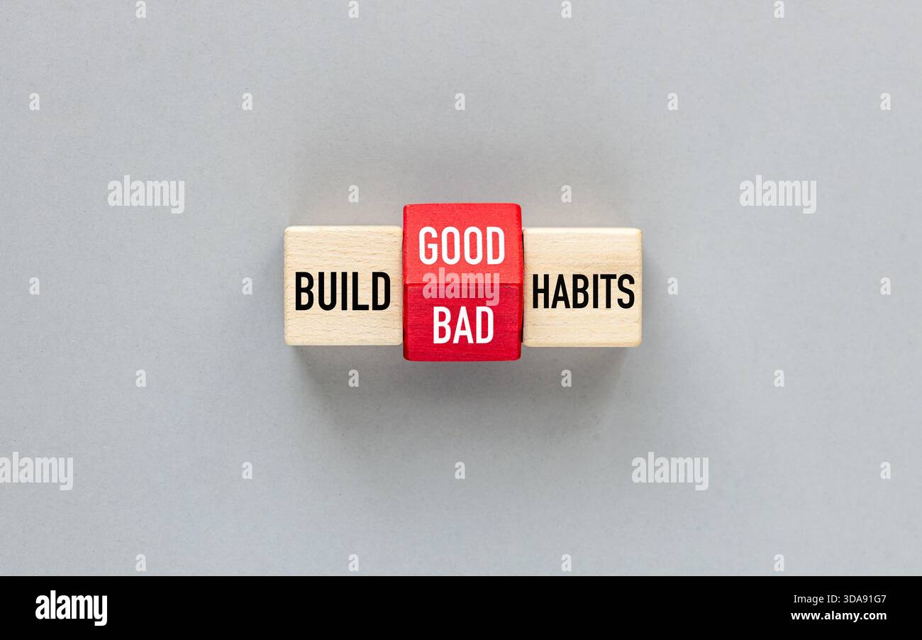Symbol of building good or bad habits. Turned wooden block and changing ...
