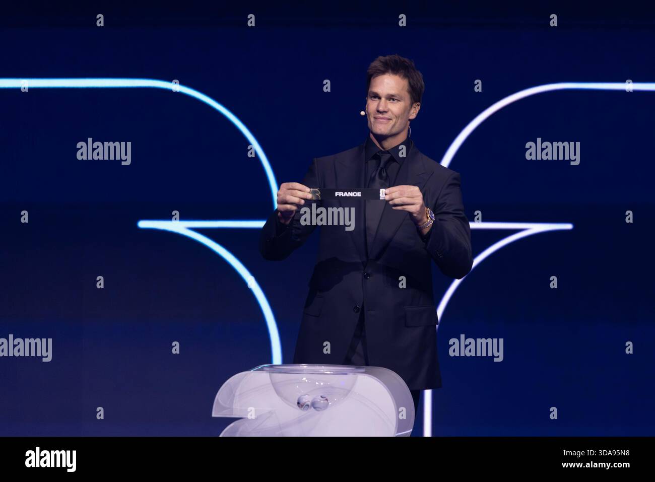 Draw assistant Tom Brady draws during the FIFA World Cup 2026 Official ...