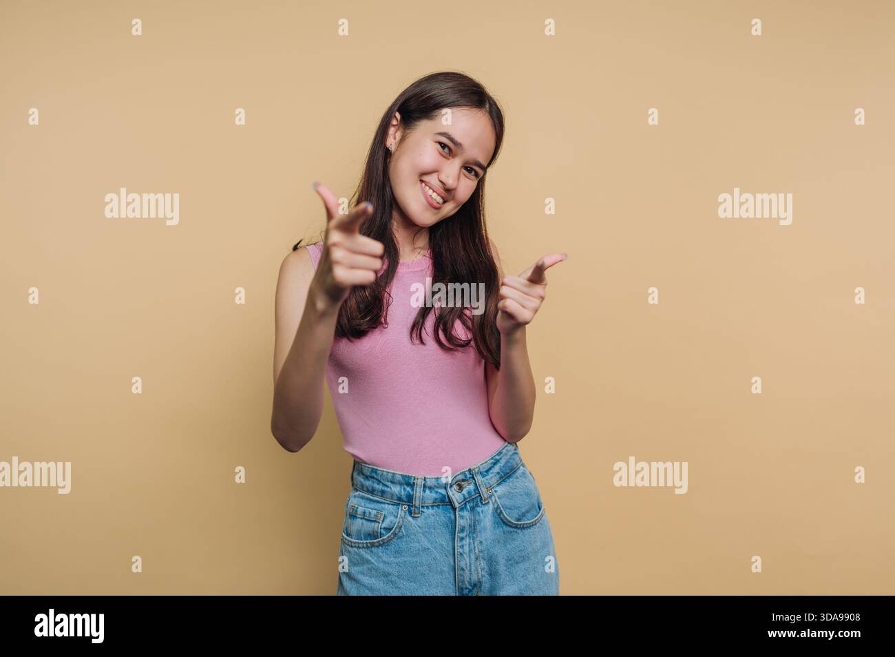 Woman wearing pink top jeans hi-res stock photography and images - Alamy