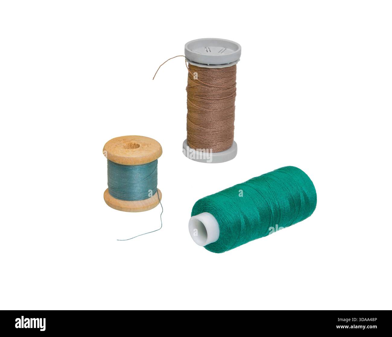 Spool thread collection,  isolated on white background. Set of different sewing spool with threads. Stock Photo