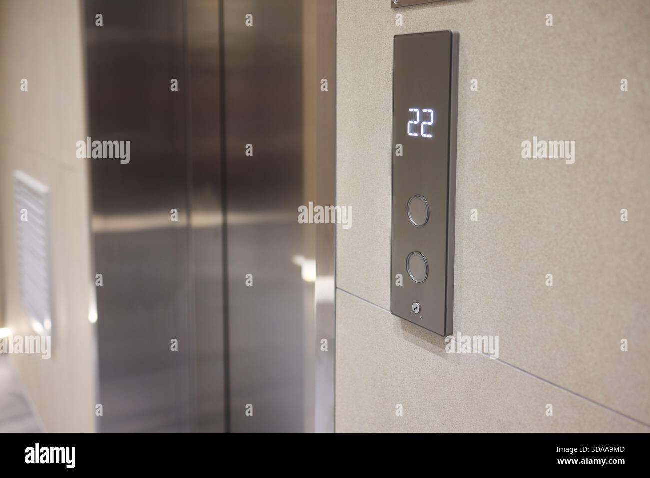 High-tech elevator panel featuring tactile buttons and illuminated screen, Advanced elevator interface showcasing touch sensitive controls alongside Stock Photo