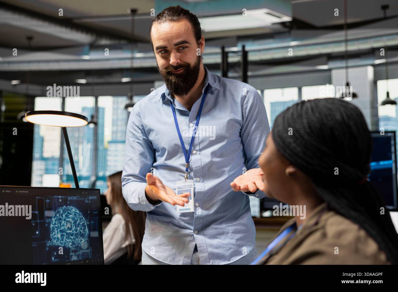 Smiling colleagues working together, adjusting deep learning algorithms parameters to automate tasks. Upbeat tech company coworkers doing brainstorming, using AI insights for code optimization Stock Photo