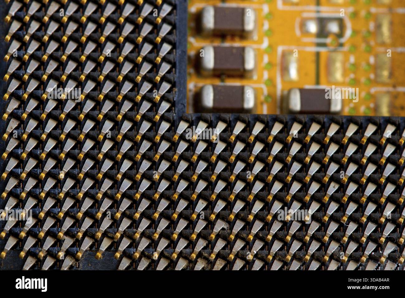 The computer processor on a white background is isolated gold color with a microcircuit Stock Photo