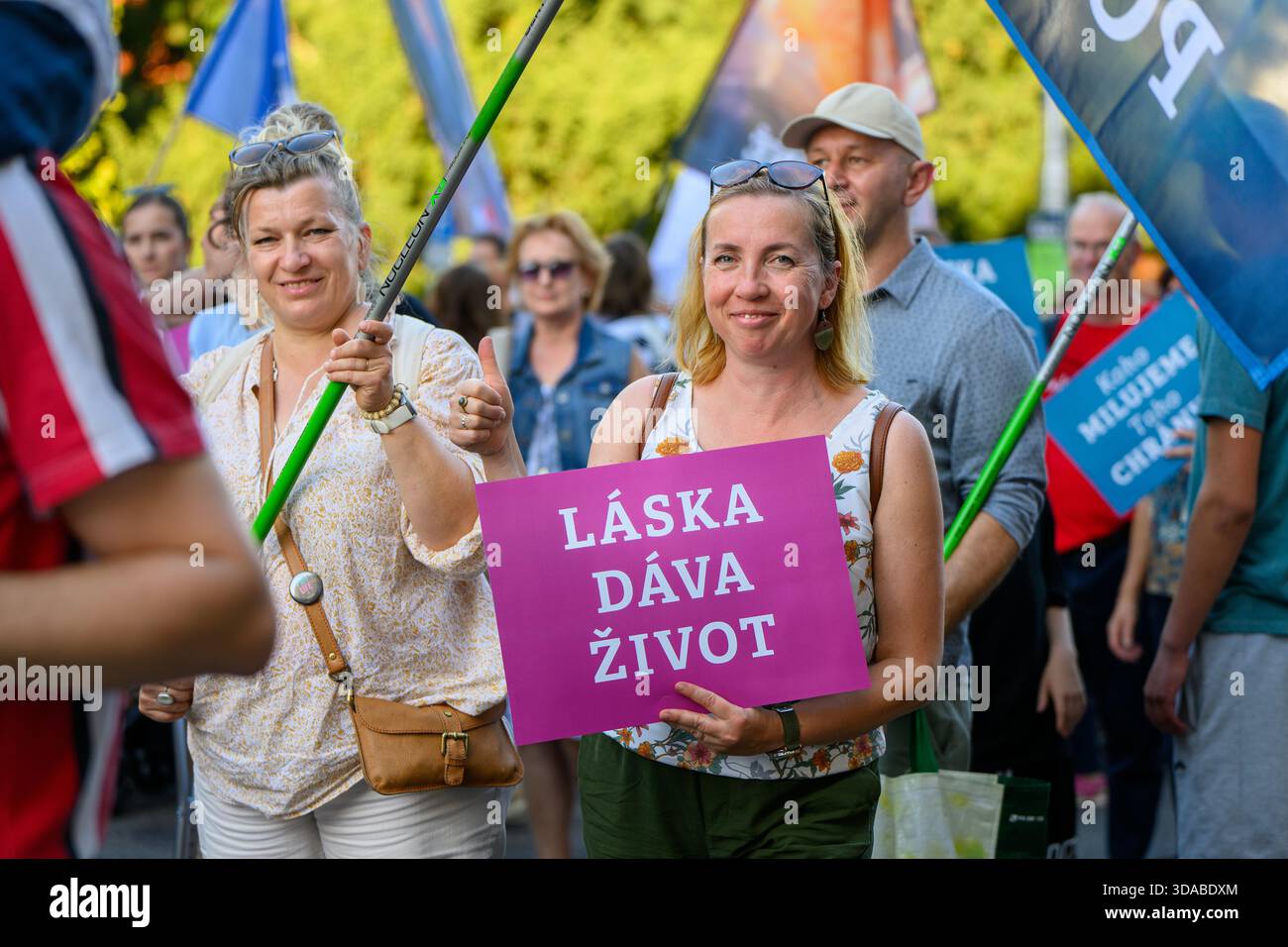 March for Life procession moving through the streets of Bratislava, Slovakia. 'Láska dáva život' [Love gives life]. - Stock Image