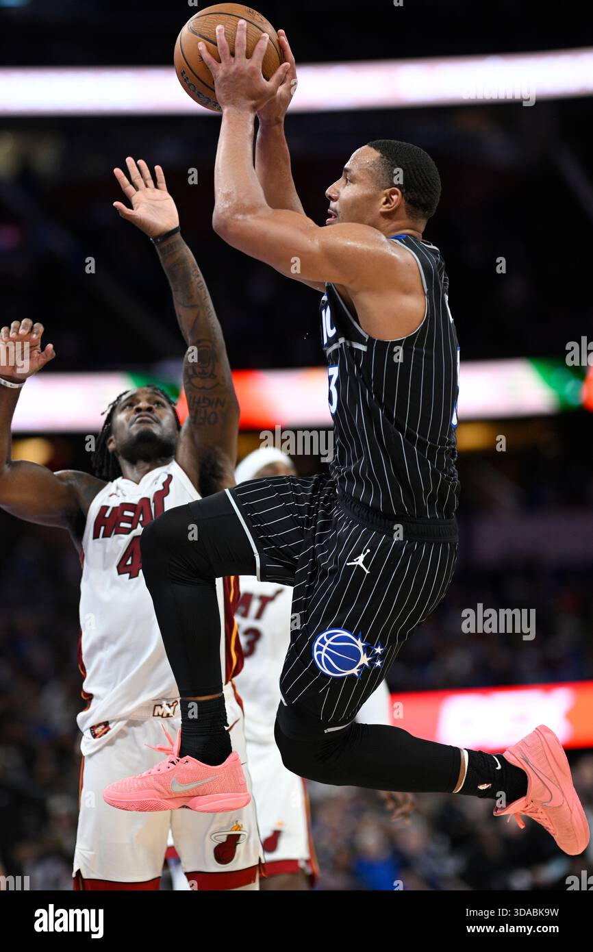 Orlando Magic guard Desmond Bane (3) goes up to shoot in front of Miami ...