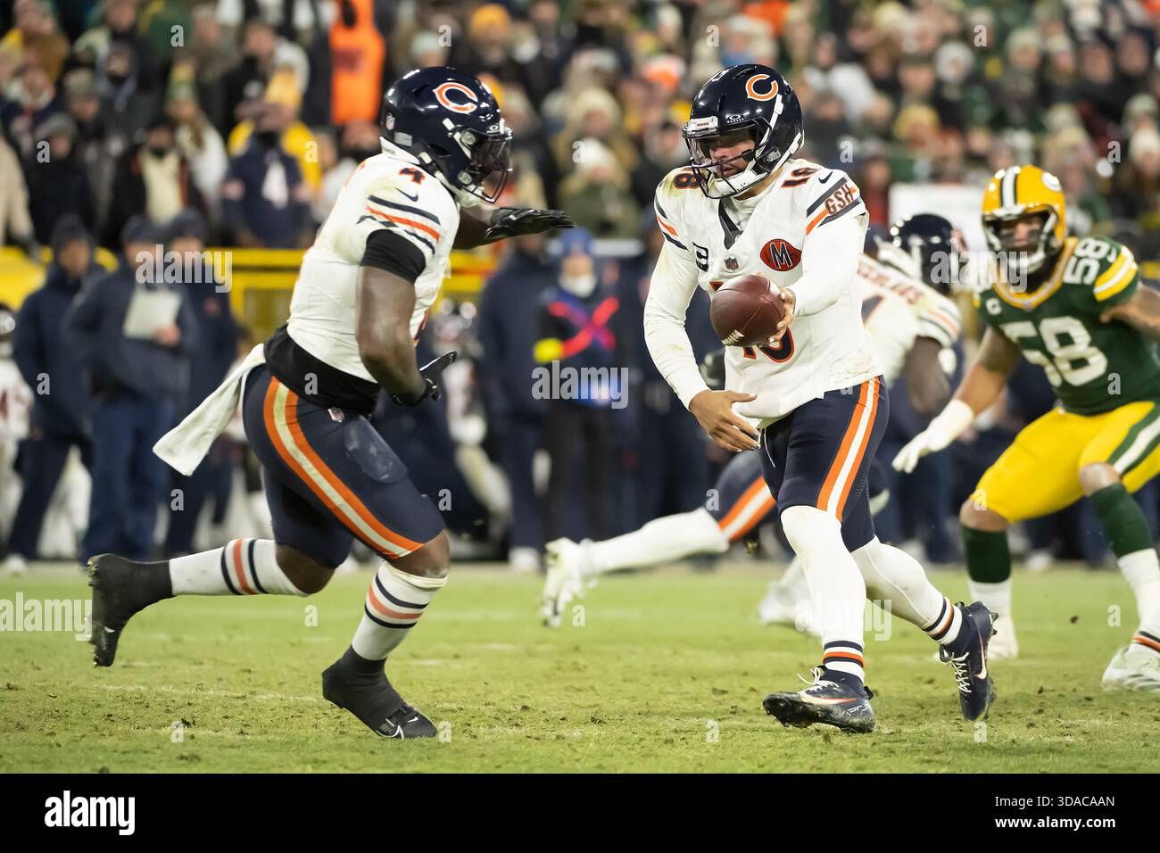 December 7, 2025: Chicago Bears quarterback Caleb Williams (18) hands ...