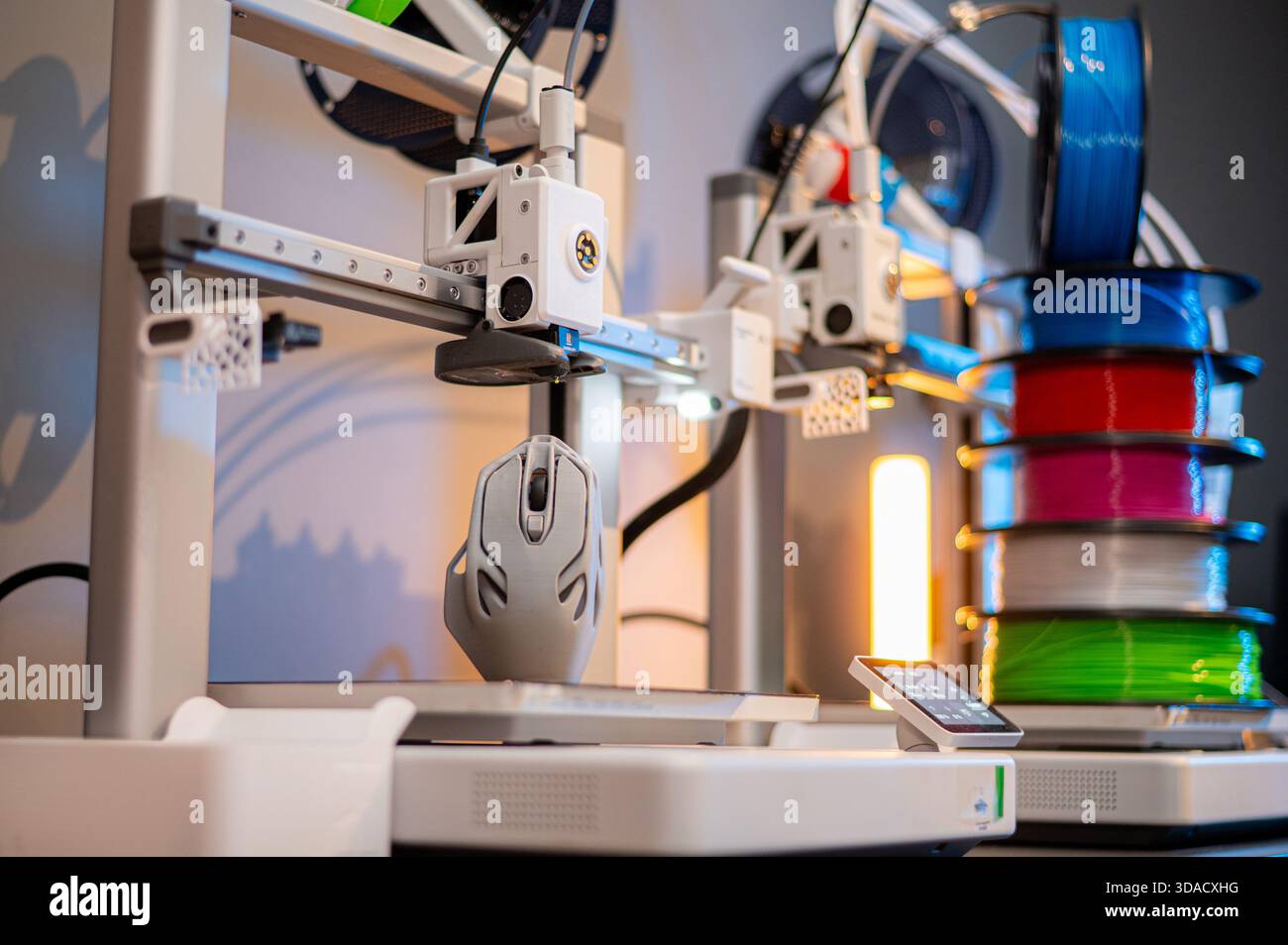 A student man print prototype on 3D printer Stock Photo