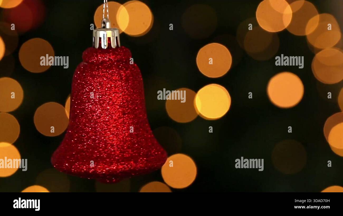 Red glitter bell ornament is hanging in 3D render with silver cap, bokeh lights, business theme Stock Photo