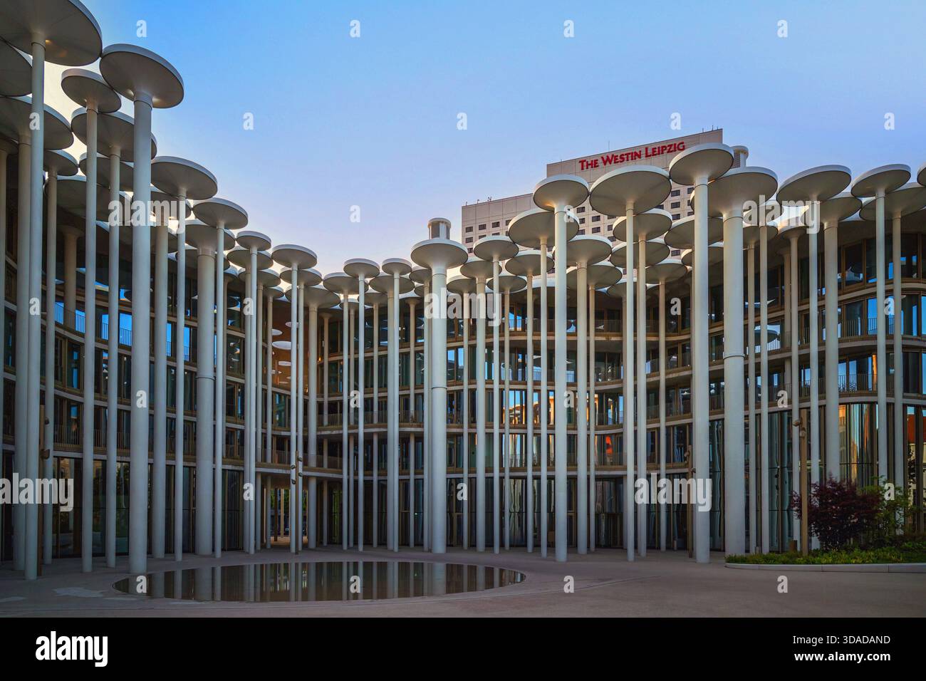 stone palms in the Courtyard of Headquarters building of the Saechsische Aufbau Bank, Germany, Saxony, Leipzig Stock Photo