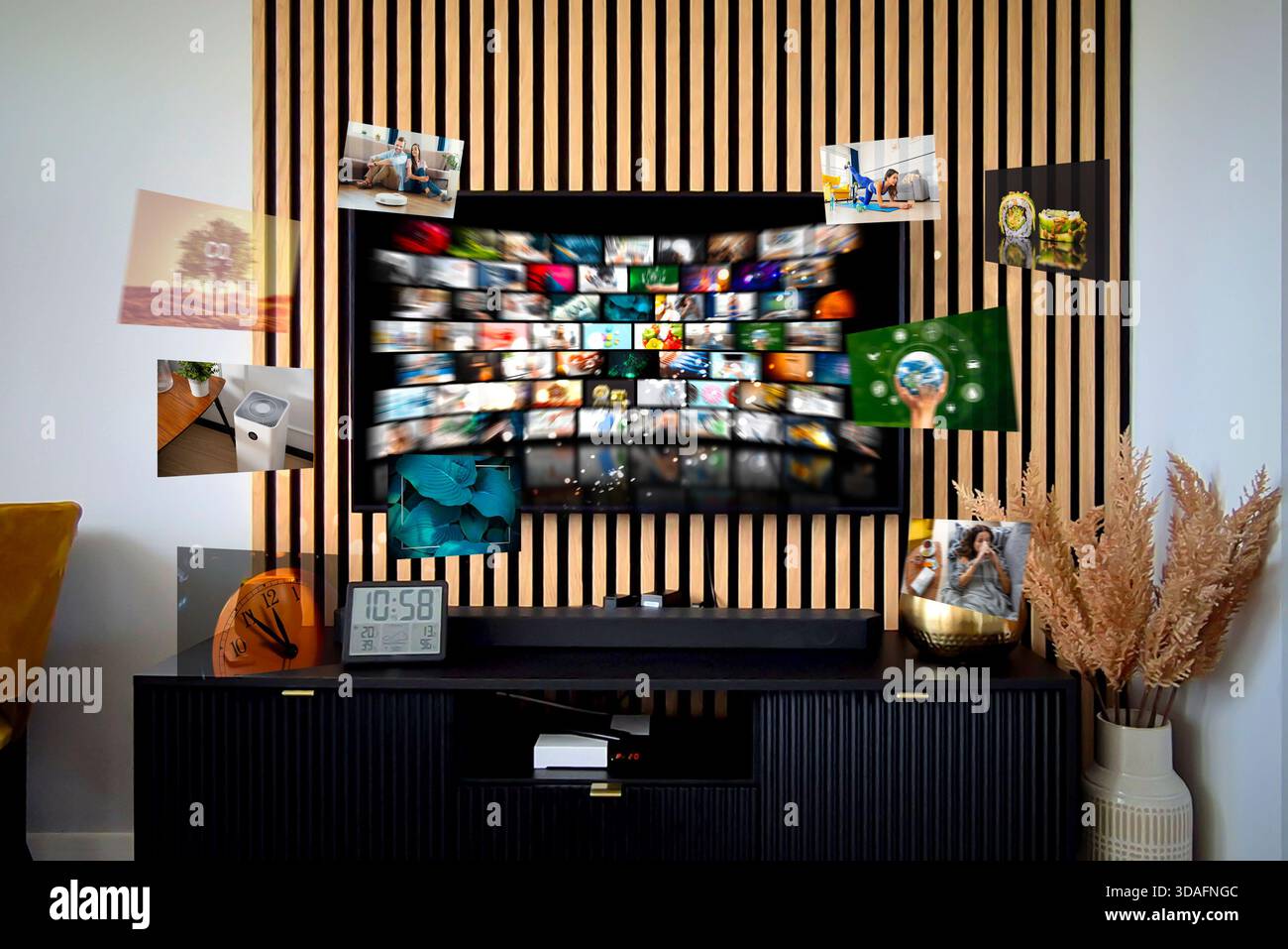VOD multimedia TV streaming concept with hand holding remote control Stock Photo