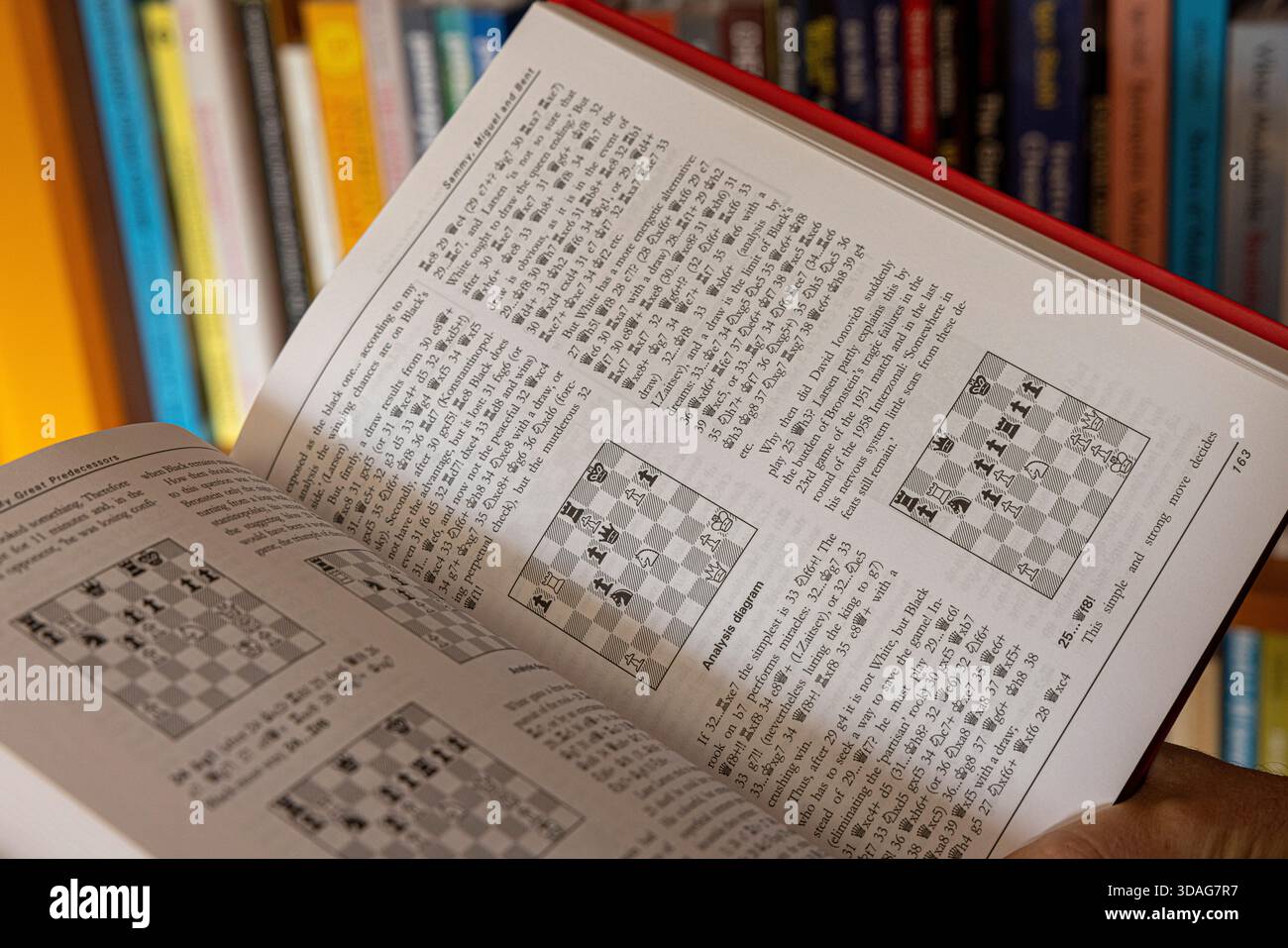 chess instruction book lies open Stock Photo