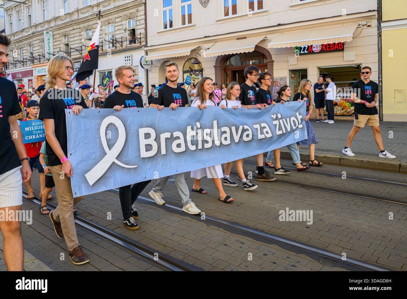 March for Life procession moving through the streets of Bratislava, Slovakia. - Stock Image