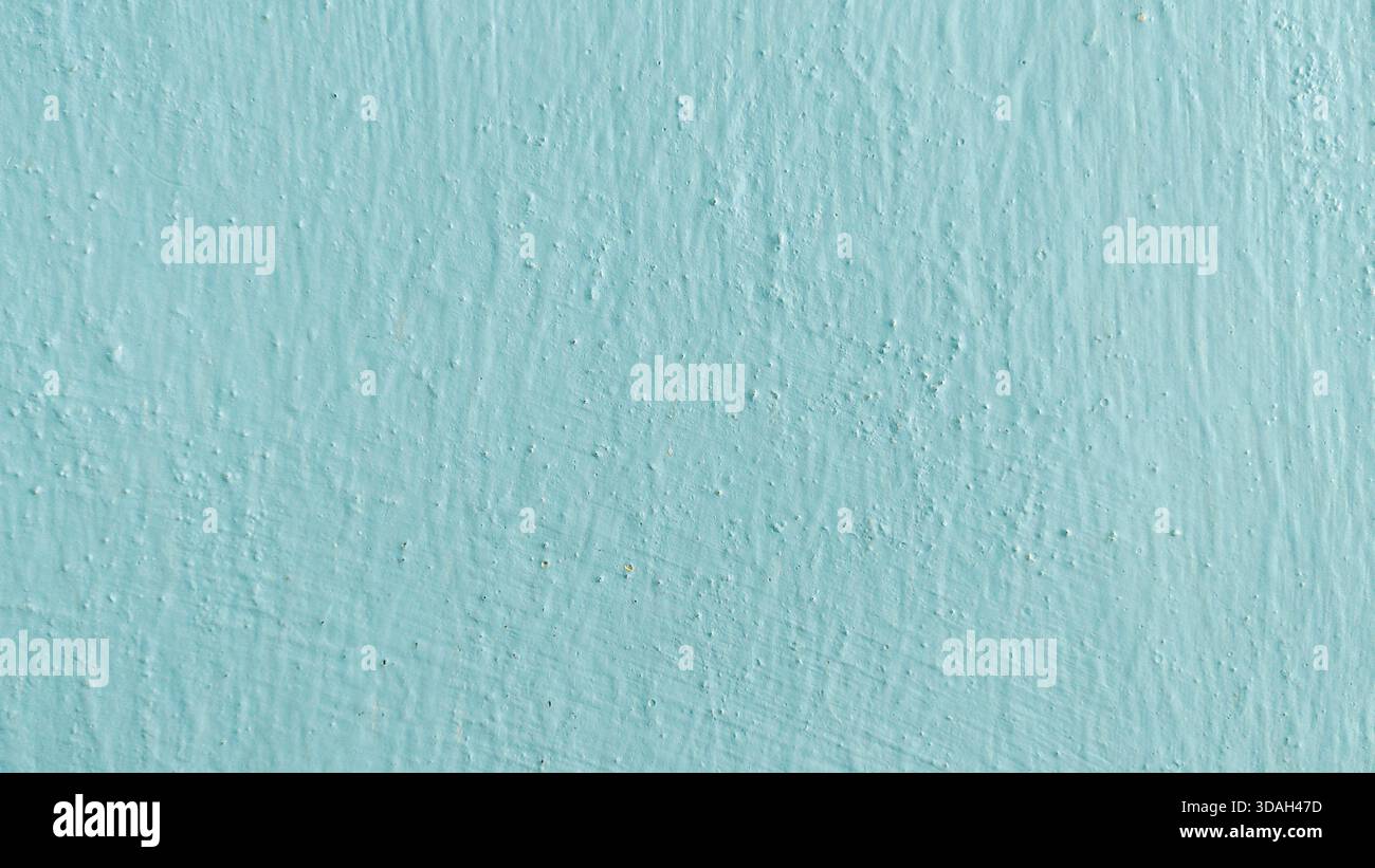 Close-up Light Blue Painted Wall Rough Stucco Texture Background Stock Photo